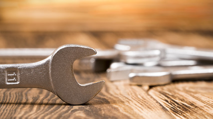 Spanners on a wooden background