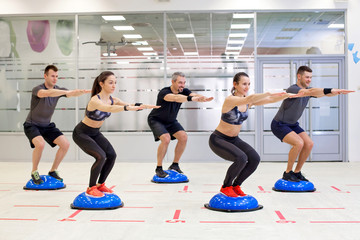 Exercising on bosu ball