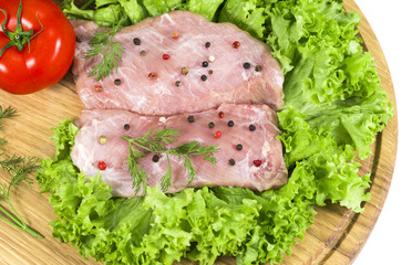 meat greens and tomatoes on a white background