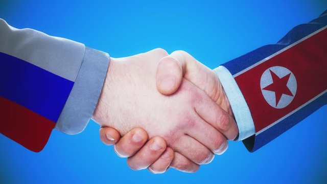 Russia - North Korea / Handshake concept animation about countries and politics / With matte channel
