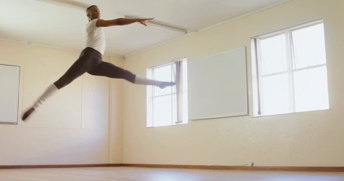Male ballet dancer dancing in the studio