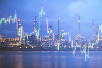 Oil refinery with candlestick graph background , Business and financial concept