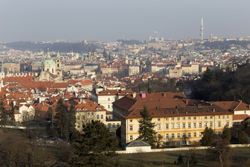 Sunny frosty winter Prague City with its Cathedrals, historical Buildings and Towers, Czech Republic