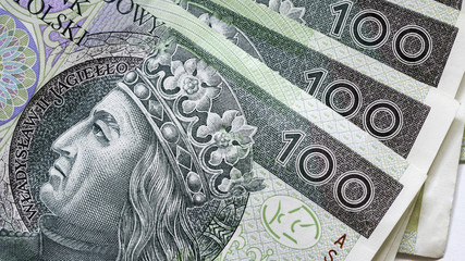 Close up of new Polish banknotes hundred zloty - obrazy, fototapety, plakaty