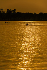 silhouette of  Kayaking in Twilight time