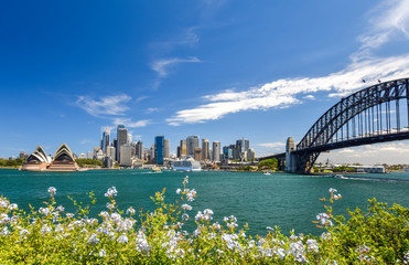 Stunning wide angle city skyline view of the Sydney CBD harbour area at Circular Quay with the...