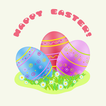 Easter blue; red; purple painted egg in green grass