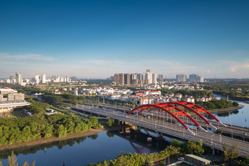 HO CHI MINH, VIETNAM - NOV 20, 2017: Royalty high quality stock image aerial view of Ho Chi Minh city, Vietnam. Beauty skyscrapers along river light smooth down urban development in Ho Chi Minh City