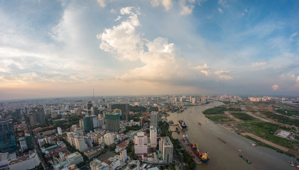 HO CHI MINH, VIETNAM - NOV 20, 2017: Royalty high quality stock image aerial view of Ho Chi Minh city, Vietnam. Beauty skyscrapers along river light smooth down urban development in Ho Chi Minh City