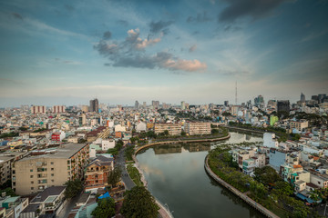 HO CHI MINH, VIETNAM - NOV 20, 2017: Royalty high quality stock image aerial view of Ho Chi Minh city, Vietnam. Beauty skyscrapers along river light smooth down urban development in Ho Chi Minh City