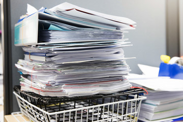 Business and finance concept of office working, Pile of unfinished documents on office desk, Stack of business paper