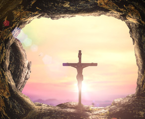 Good Friday concept: Empty tomb with Jesus Christ on cross