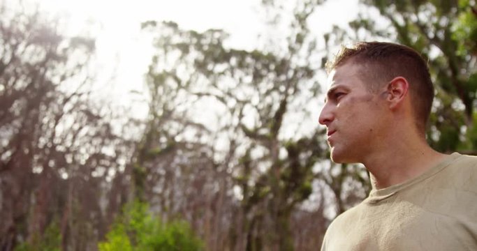 Military soldier standing at boot camp 