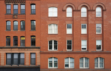 Obraz premium close up on old brick wall building exterior in the city