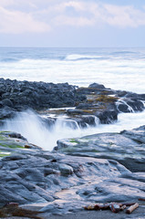 Ocean Seascape landscape on rocky beach 