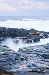 Ocean Seascape landscape on rocky beach 