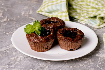 Chocolate muffins with crispy top