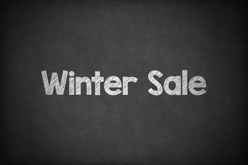 Winter Sale on Textured Blackboard.