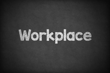 Obraz premium Workplace on Textured Blackboard.