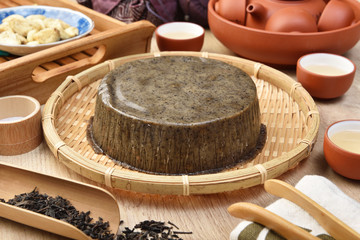 Sesame with lotus seeds rice cake in bamboo basket  