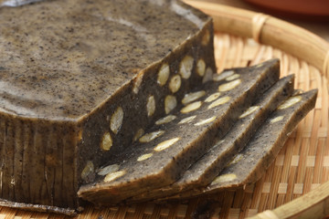 Fototapeta na wymiar Closeup of sesame with lotus seeds rice cake