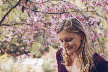 Blonde Woman Portrait with Cherry Blossoms