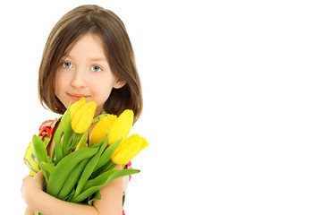 Little girl with a bouquet of flowers