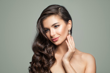 Perfect Fashion Model Woman with Silver Jewelry Diamond Earrings. Perfect Female Face