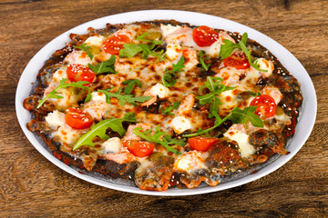 Pizza with salmon and mozzarella