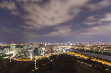 Fototapeta premium cityscape of Vienna city at night, aerial view. Austria