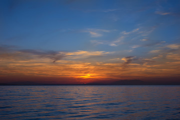 Naklejka na ściany i meble Gorgeous sea and sky colors in the dusk, Sithonia, Chalkidiki, Greece 