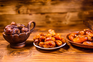Date fruits on the rustic wooden table