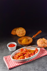 sausage in curry sauce