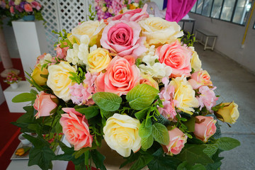 Fake flower and Floral background. rose flowers made of fabric. The fabric flowers bouquet. Colorful of decoration artificial flower