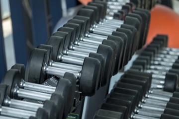 Fototapeta na wymiar Fitness equipment in sport gym club. Close-up shot.