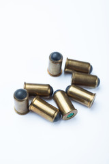 Close-up, old rubber bullets on a white background.