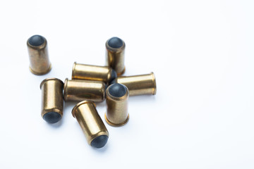 Set of rubber bullets on a white background. Empty space for text.