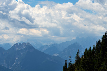 The famous mountain top Raibler Fünfspitz under a wild sky, seen from Dobratsch Nature Park