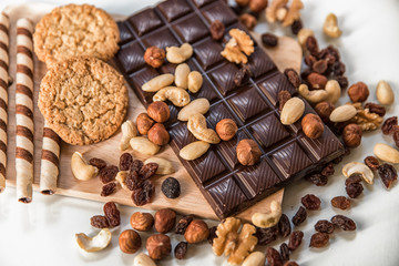 chocolate, milk chocolate with nuts, on a white background