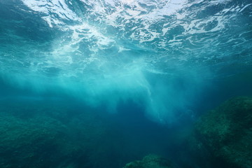 Sea foam formed by wave breaking on rock, seen from underwater, Mediterranean sea, Cote d'Azur,...