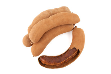 Top view tamarind pod isolated on white background with clipping path and soft shadow.