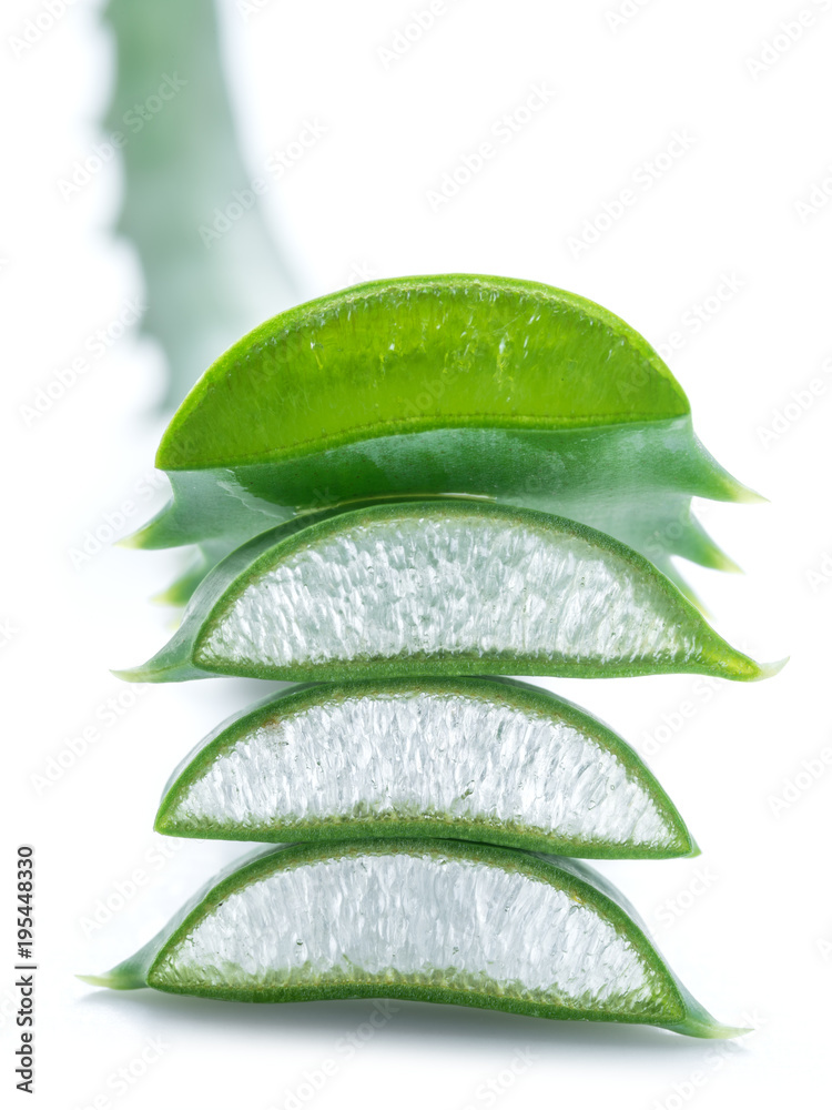 Wall mural Aloe or Aloe vera fresh leaves and slices on white background.