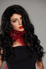 Naklejka premium Perfect Fashion Model with Makeup and Long Healthy Dark Hair