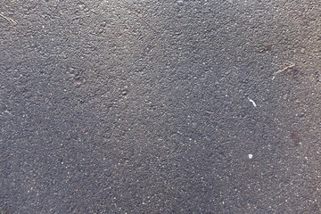 Top view of undamaged wet asphalt surface