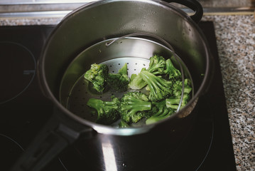 Casserole with broccoli and water to cook