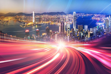 Obraz premium Motion speed light effect with Hong Kong cityscape on background