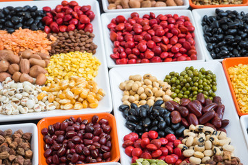 Different dry legumes in container, Multicolor dried beans for eating healthy