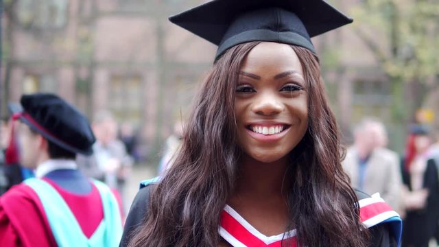 Portrait Of A Happy Attractive Black Graduate, College University Graduation Day