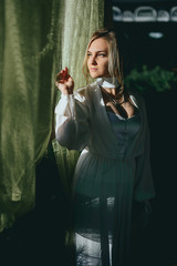 beautiful bride posing in a summer cafe