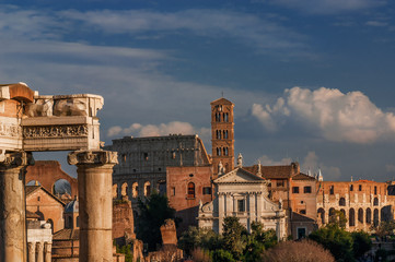 Fototapeta premium View of the Roman Forum and Coliseum at sunset